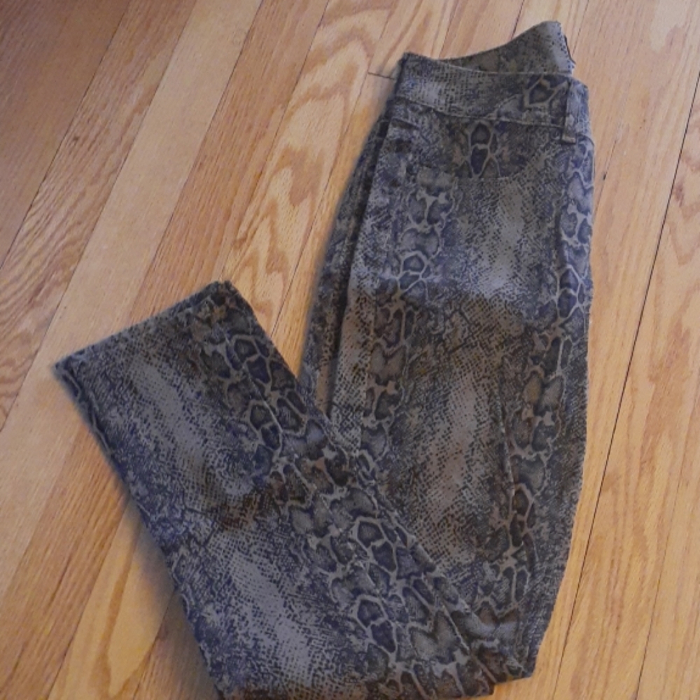 Snakeskin print skinny jeans
